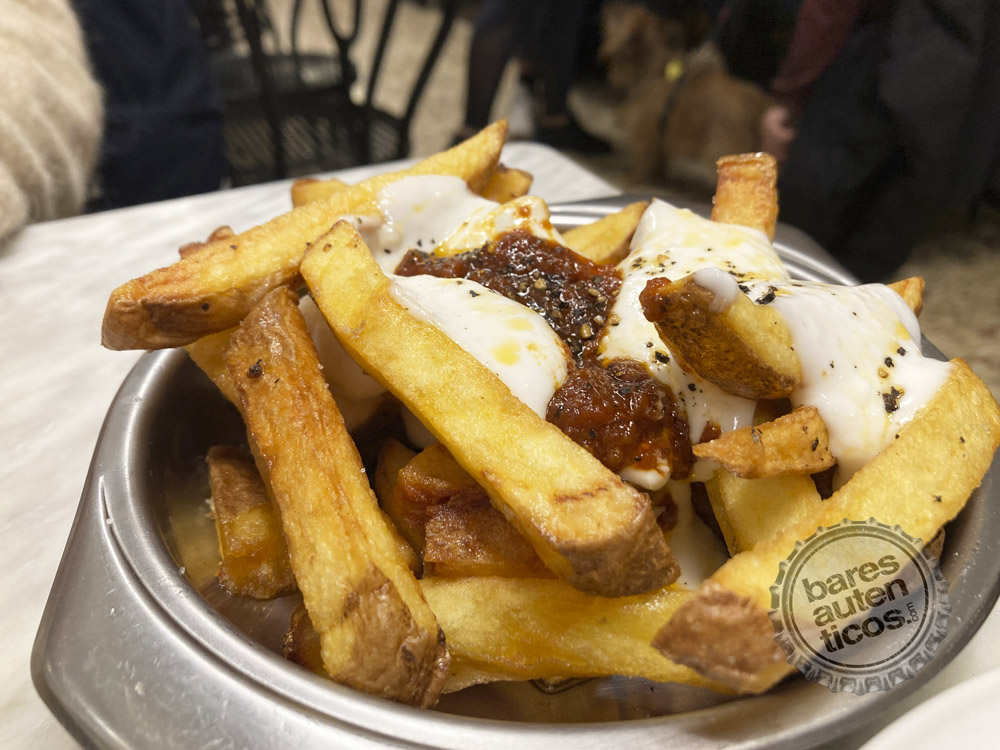 Patatas bravas — thick-cut fried potatoes with brava sauce and aioli